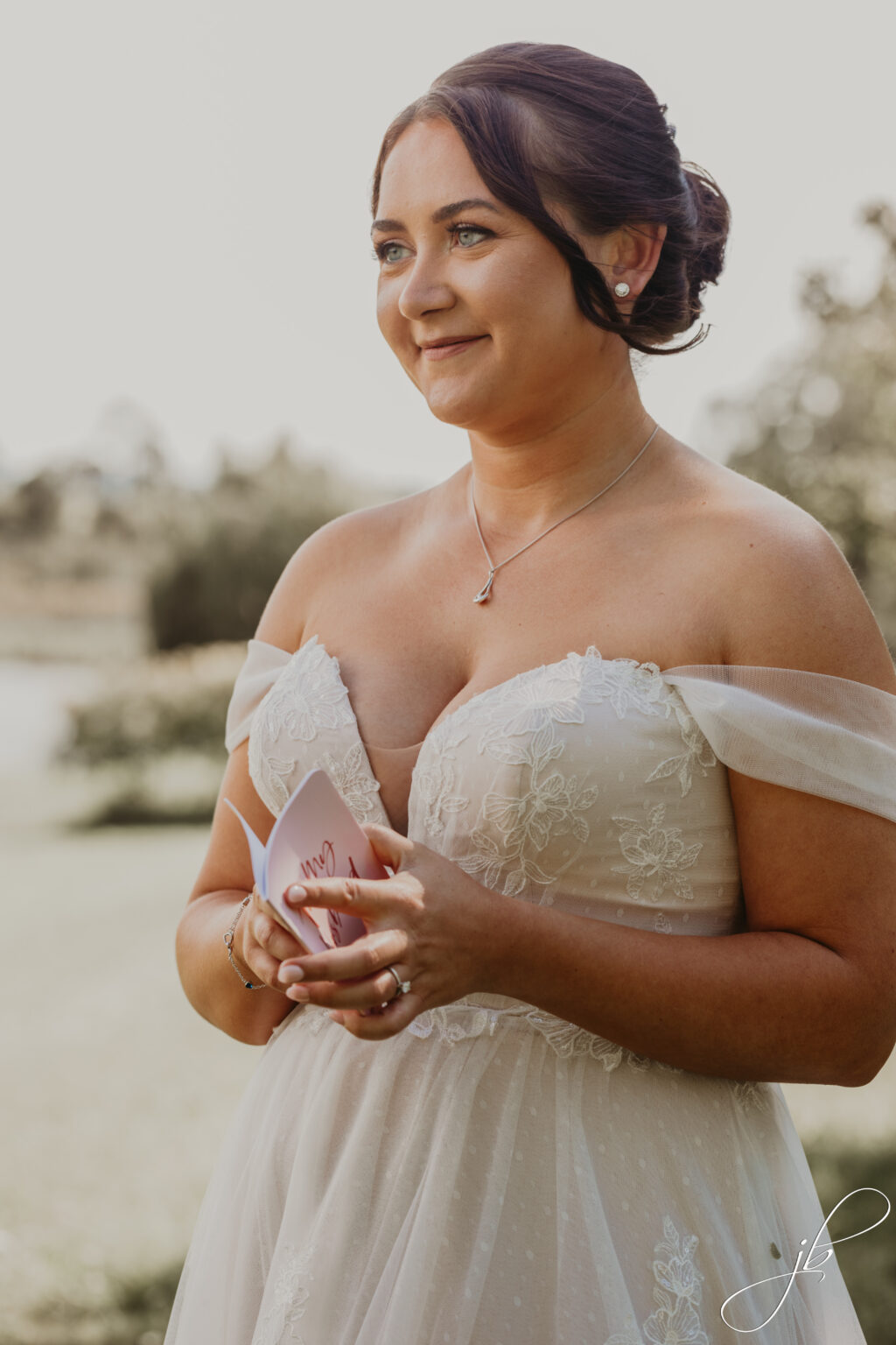 Bride wearing a Madi Lane Wedding dress