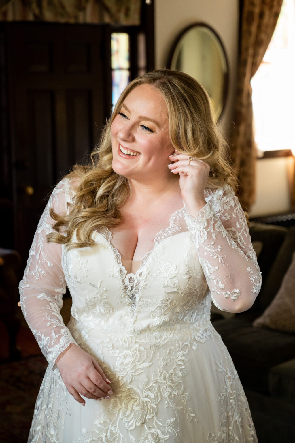 Bride in long sleeve studio levana gown