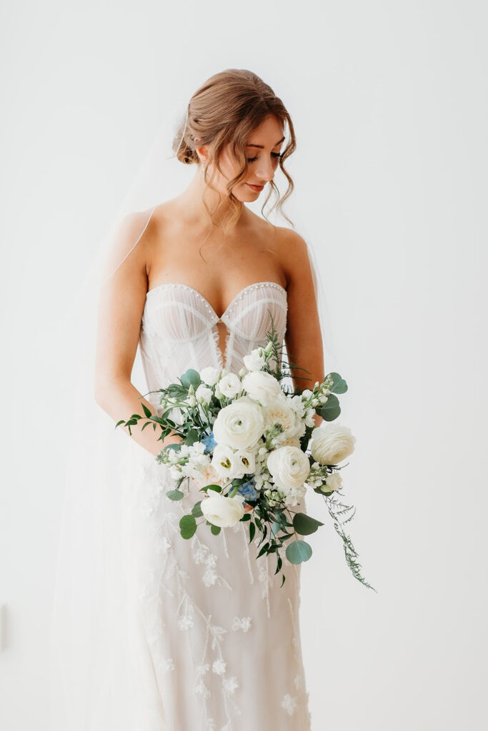 Bride in strapless gown with pearl bodice