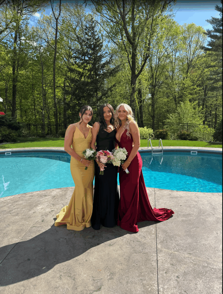 Three girls in prom dresses